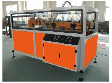 Double traction cutting machine